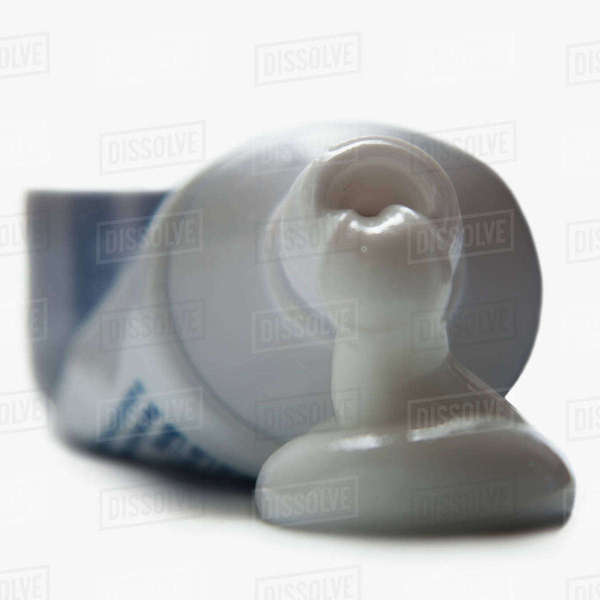 Open toothpaste tube Stock Photo Dissolve