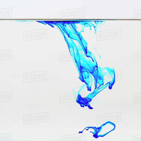 Blue dye floating in water Stock Photo Dissolve