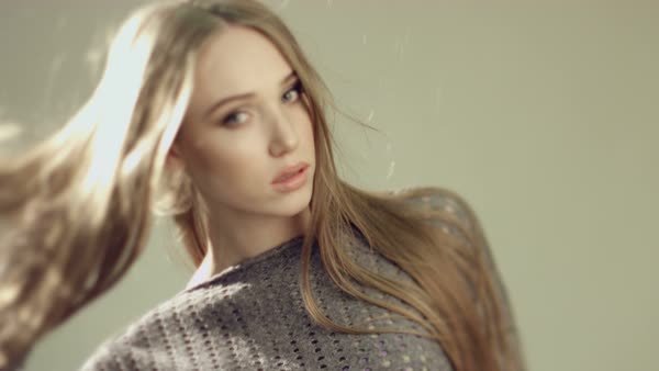 Sensual Woman With Long Straight Hair On A Fashionable Photo Shoot