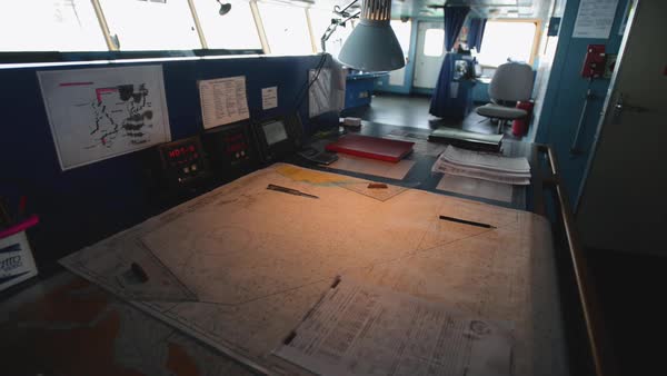Navigation Map Of Sea On The Table In Cabin Of Cargo Ship Stock