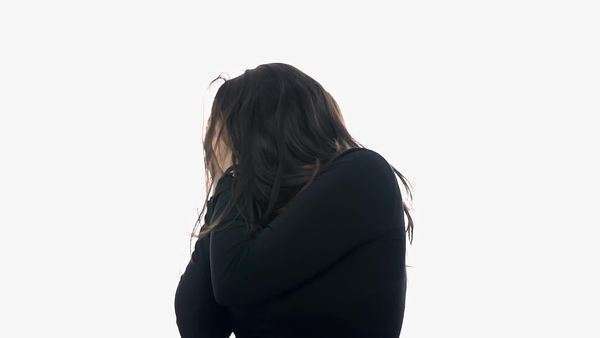 Female Scared Of Looking On White Background Attractive Brown