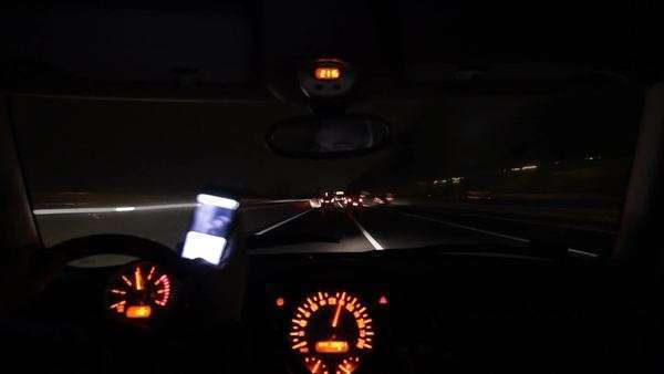 Texting And Playing With Smartphone While Driving Overtaking Texting And Playing With Smartphone While Driving Overtaking Dangerously At Night Inside Car Point Of View Stock Video Footage Dissolve
