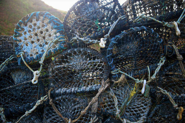Lobster nets, Fishermans Cove; Aberdaron, Wales - Stock Photo - Dissolve