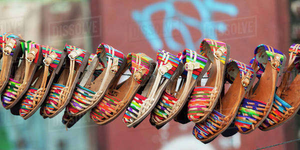 Colourful shoes hanging on display;Guatemala city guatemala - Stock