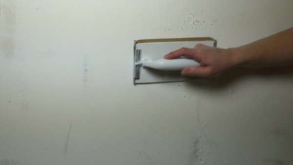 Man Hand Sanding Plaster Wall Close Up Stock Video Footage