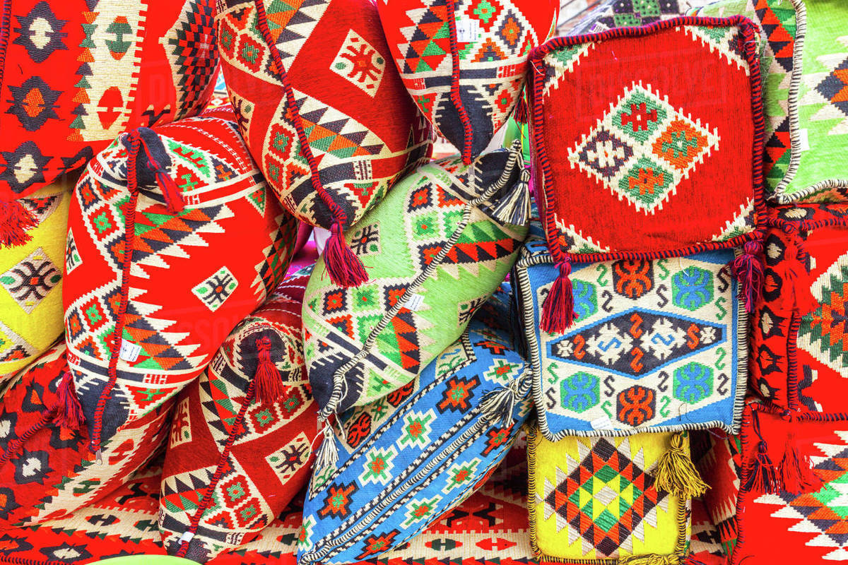Bright textiles in market in Doha, Qatar Stock Photo Dissolve