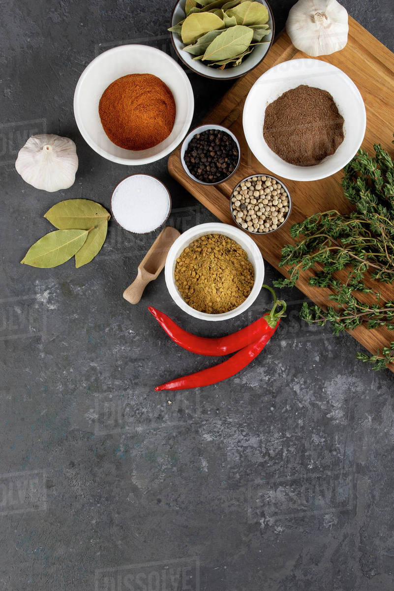 Herbs and spices with chili peppers Stock Photo Dissolve