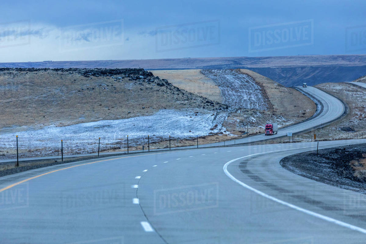 Highway during winter in Glenns Ferry, Idaho Stock Photo Dissolve