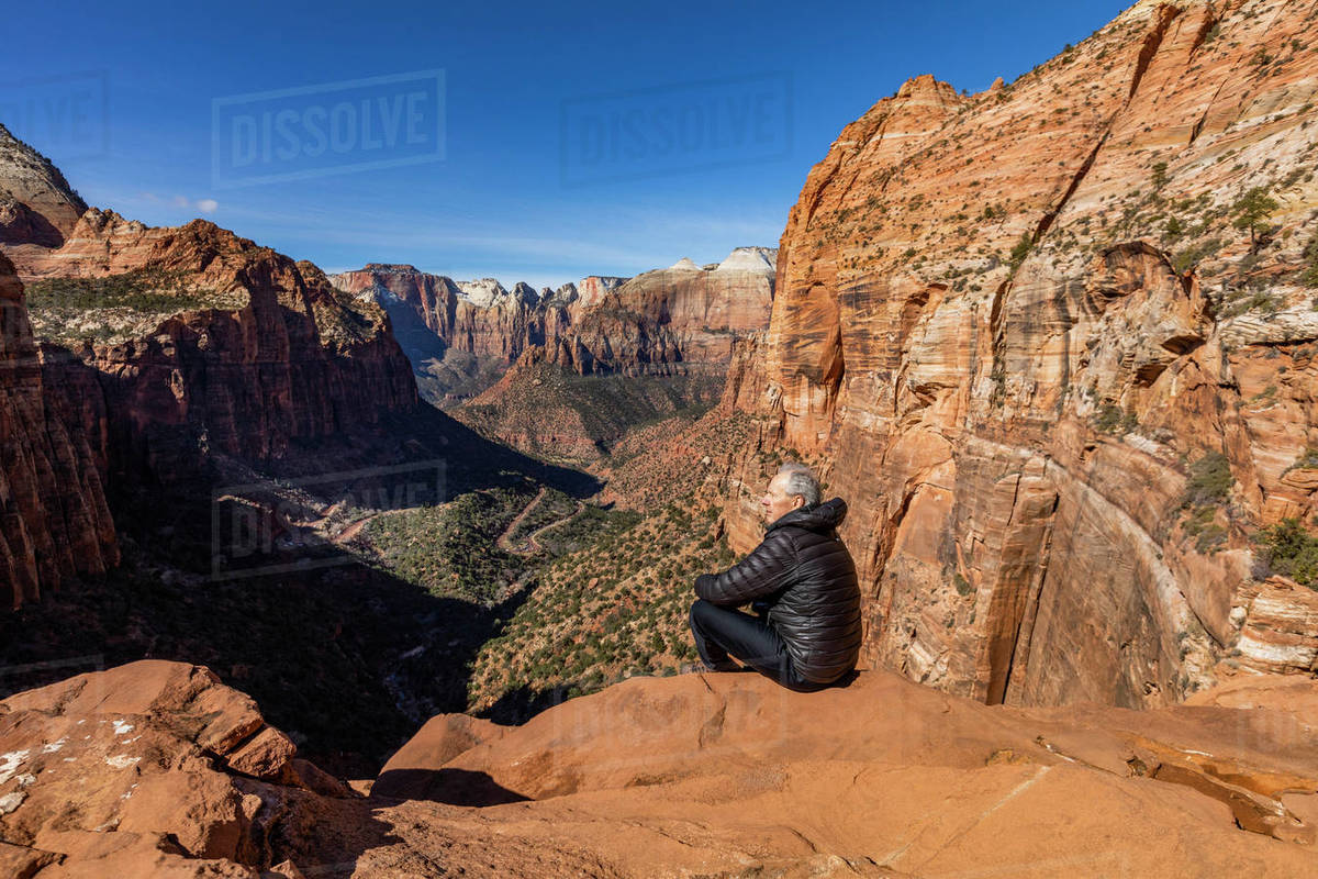 United States, Utah, Zion National Park, Senior man looking over Zion