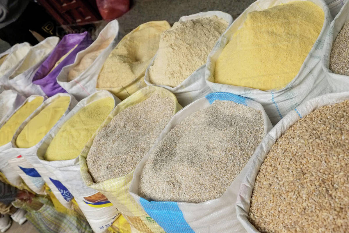 Sacks of grains and cous cous for sale Stock Photo Dissolve