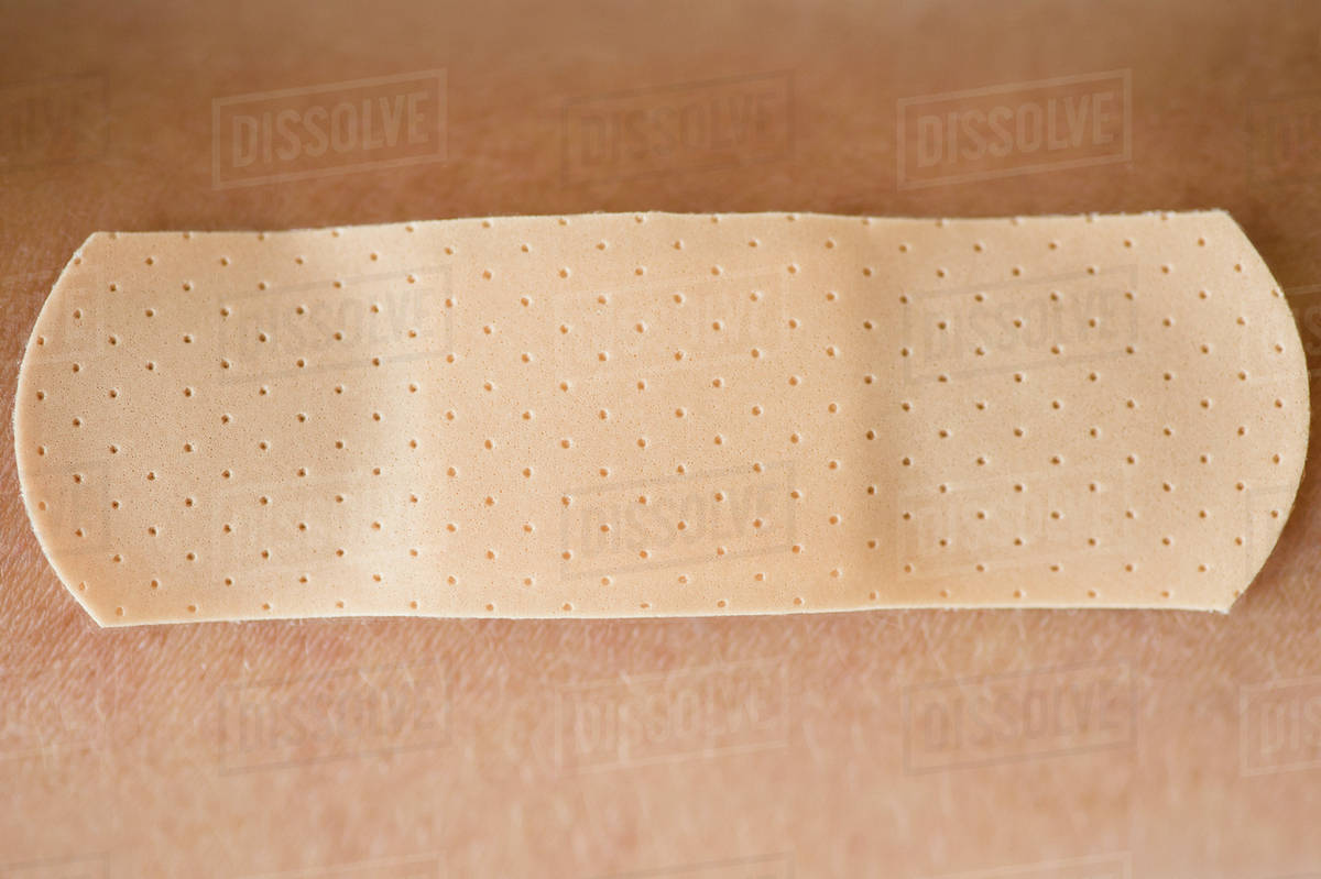 Studio shot of adhesive bandage Stock Photo Dissolve