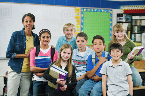 Group of elementary school students in classroom - Royalty-free Stock ...