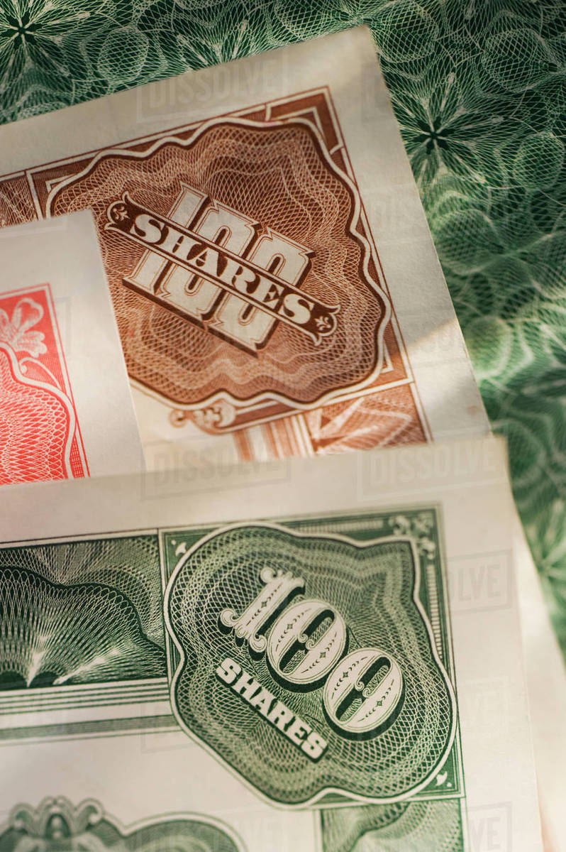 Old corporate bonds Stock Photo Dissolve