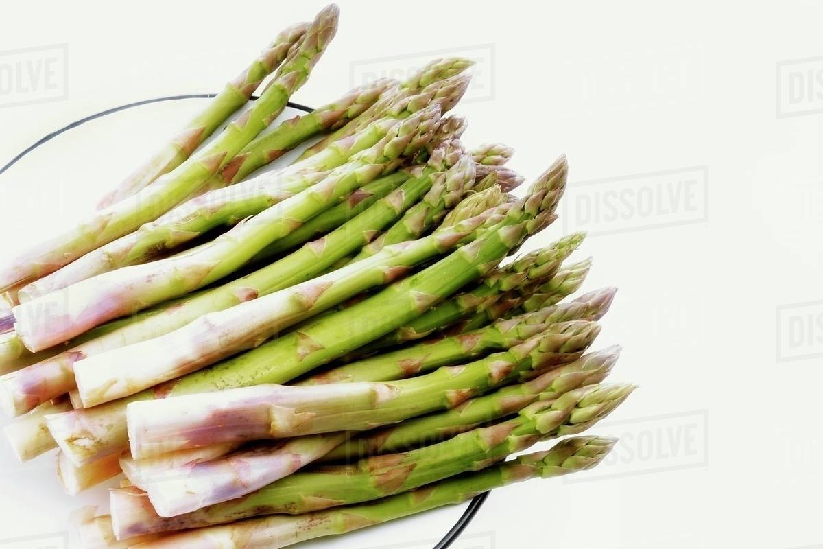 Green asparagus stalks Stock Photo Dissolve