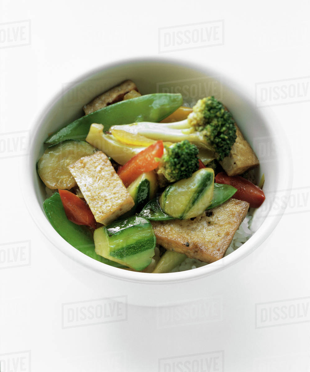 Tofu and Vegetable Stir Fry Over Rice Stock Photo Dissolve