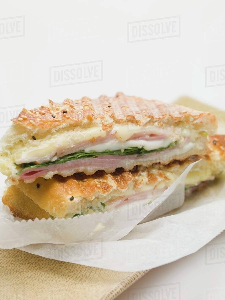 Toasted flatbread with cheese and ham filling Stock Photo Dissolve