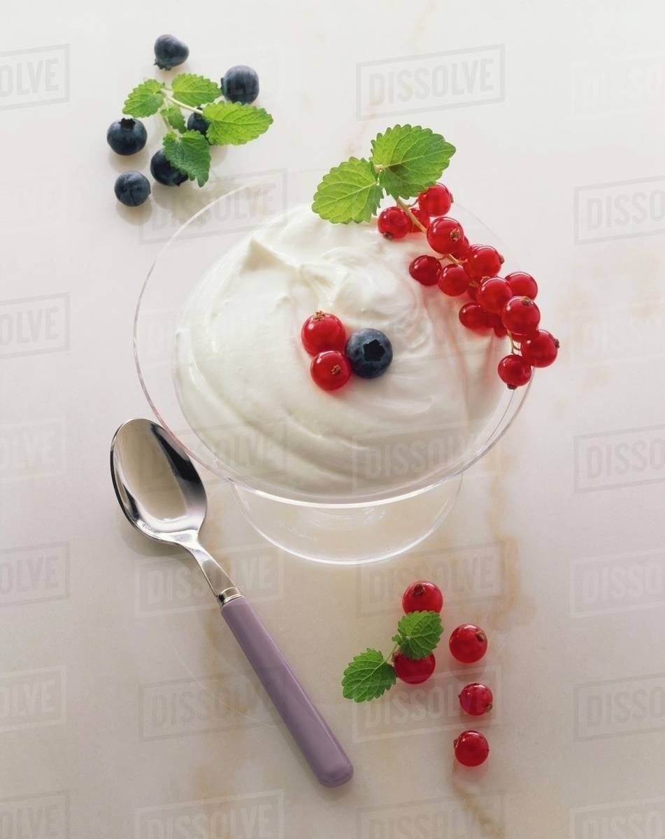 Quark cream with berries Stock Photo Dissolve