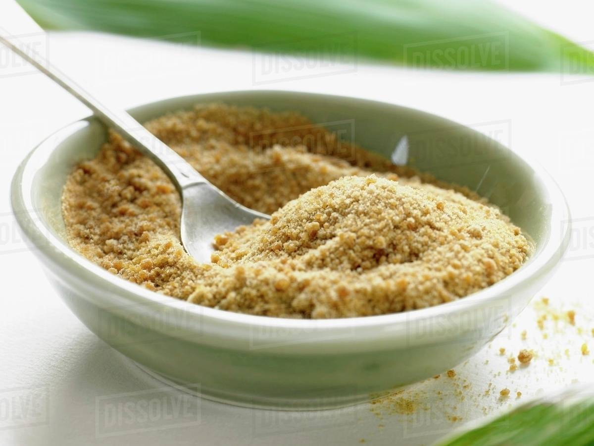 Cane sugar in dish Stock Photo Dissolve