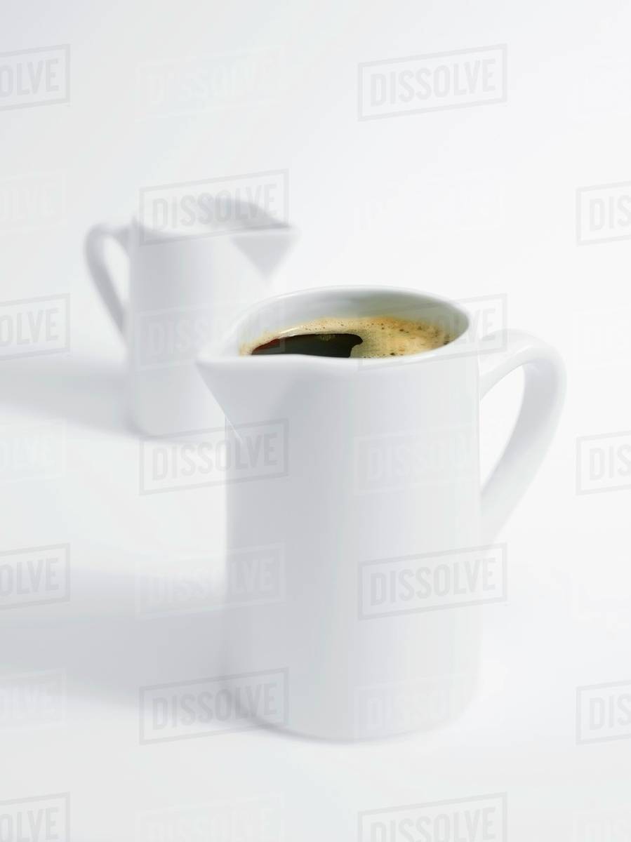 Coffee pot and milk jug Stock Photo Dissolve