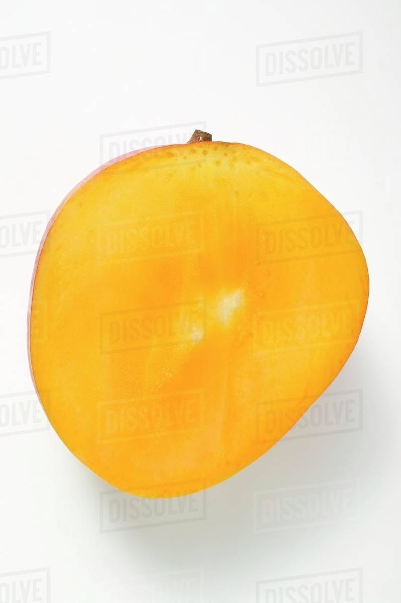 Half a mango Stock Photo Dissolve