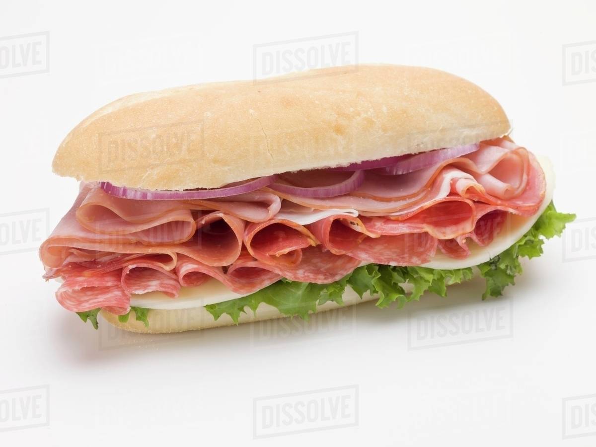Ham, salami and cheese sub sandwich Stock Photo Dissolve