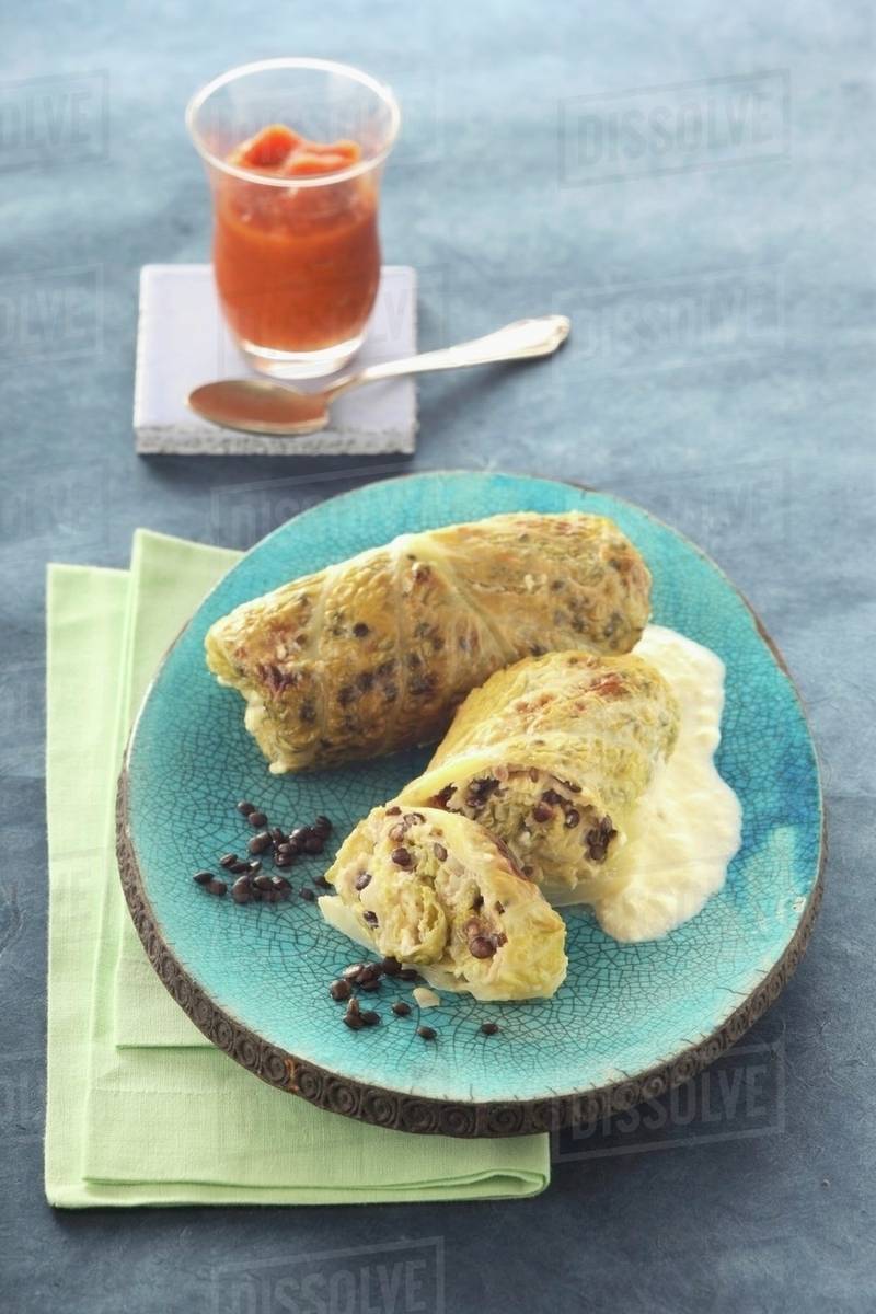 Savoy cabbage roulades with carrot sauce - Royalty-free Stock Photo ...