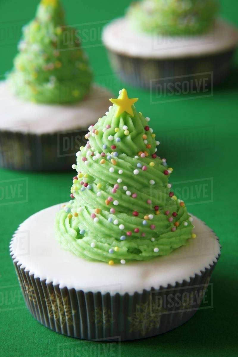 A Cupcake Decorated To Look Like Christmas Tree A Cupcake Decorated To Look Like Christmas Tree