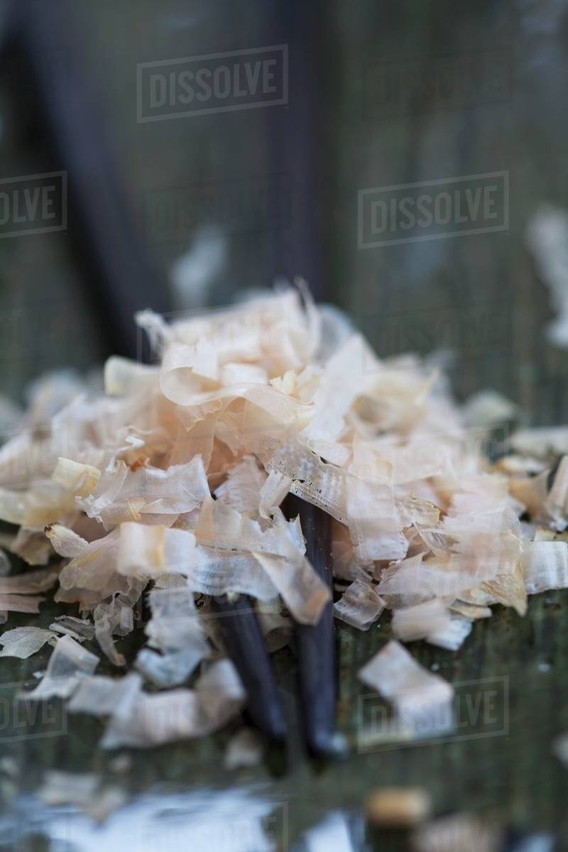 Dried bonito flakes on chopsticks Stock Photo Dissolve
