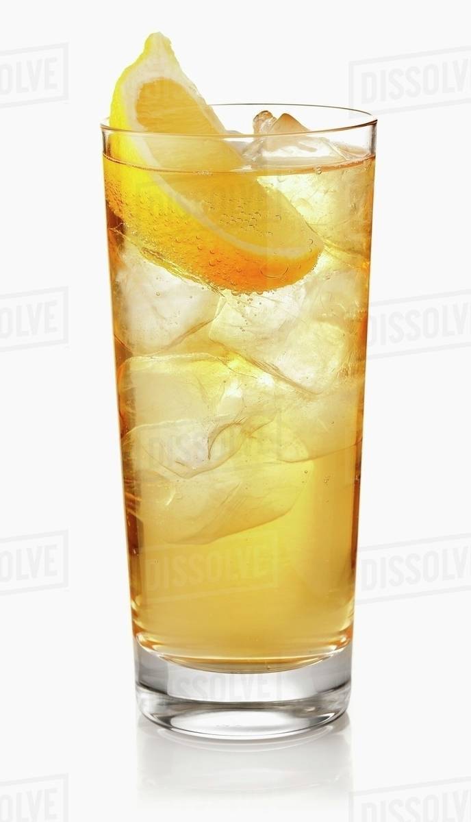 A London Buck cocktail made with gin, ice cubes and lemon Stock Photo