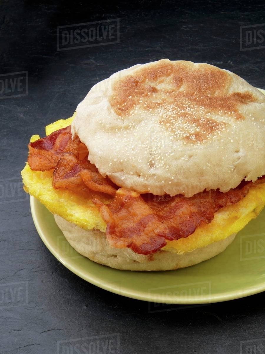 An English muffin with bacon and scrambled egg (USA) Stock Photo