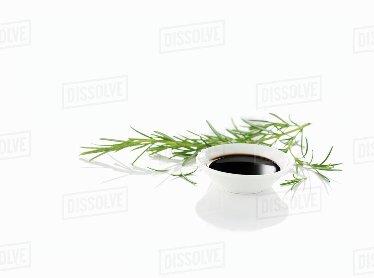 Balsamic vinegar and rosemary Stock Photo Dissolve