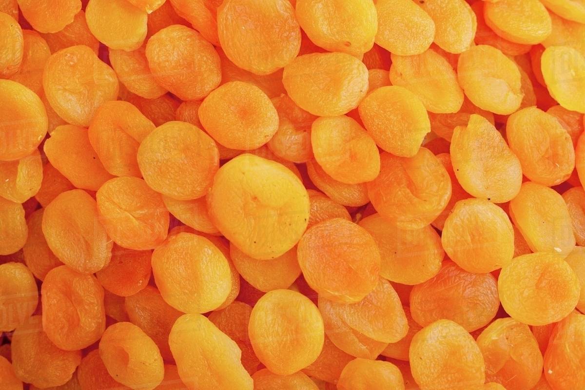 Lots of dried apricots Stock Photo Dissolve