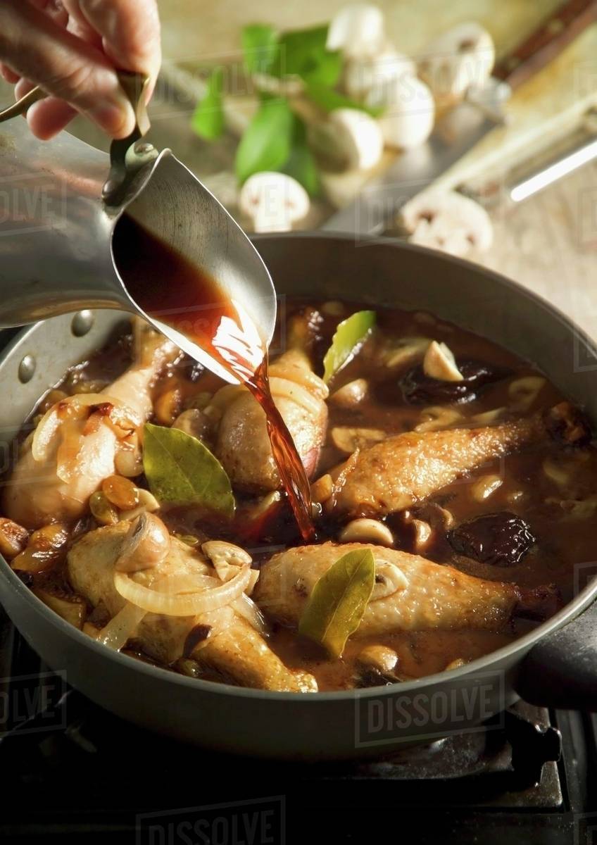 Chicken in red wine Stock Photo Dissolve