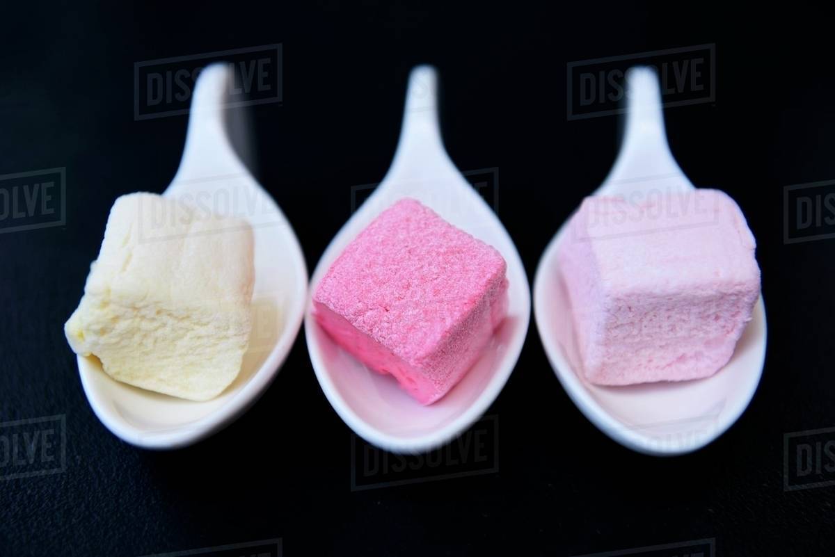 Three cubes of marshmallow Stock Photo Dissolve