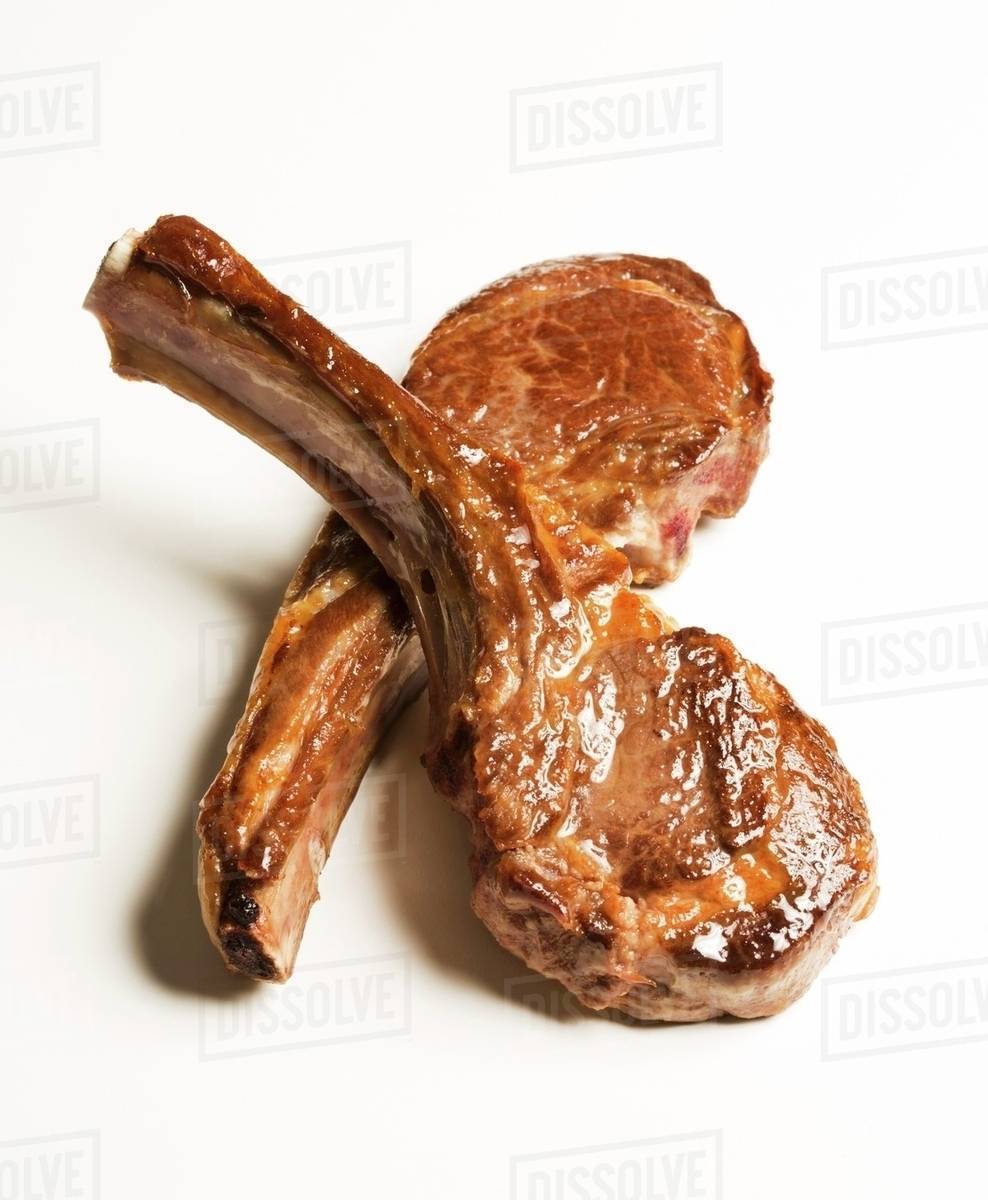 Two Lamb Chops on a White Background Stock Photo Dissolve