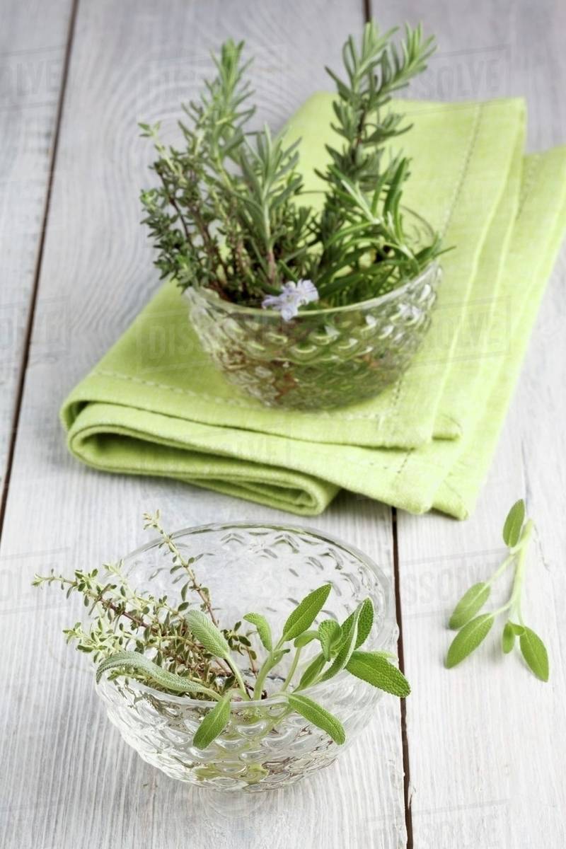 Fresh rosemary, thyme and sage Stock Photo Dissolve