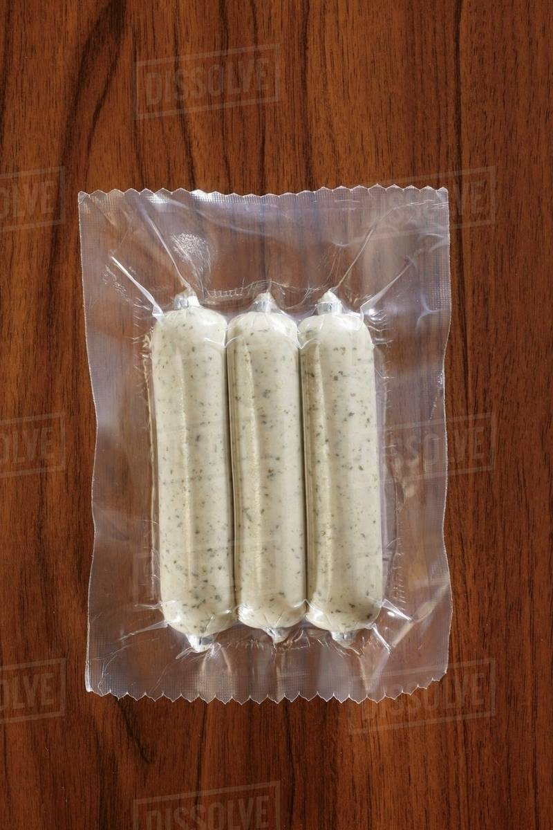 Soy sausages, vacuum packed Stock Photo Dissolve