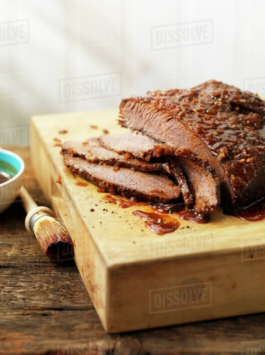 Grilled and marinated beef brisket, sliced Stock Photo Dissolve