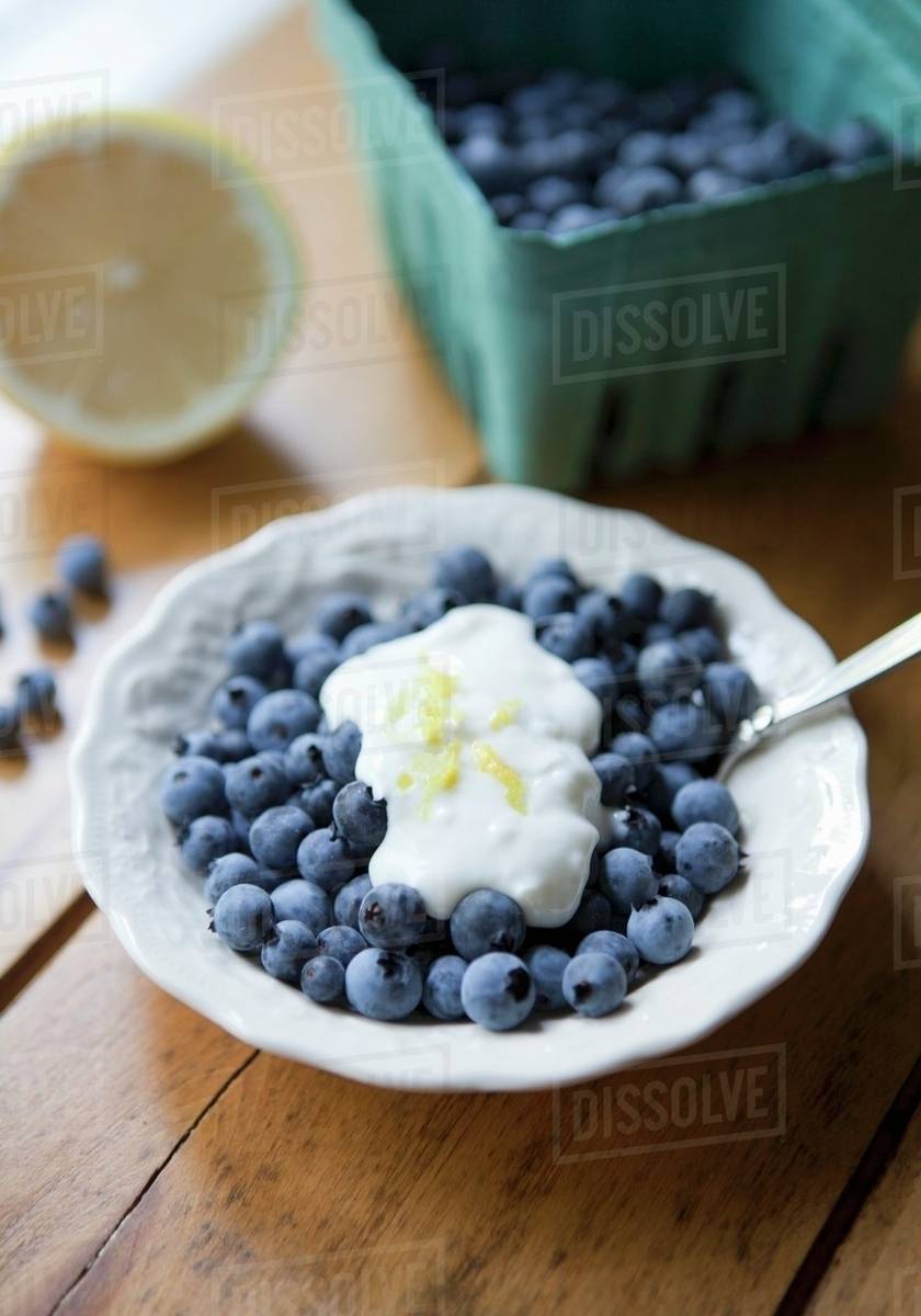 Blueberries with yoghurt Stock Photo Dissolve
