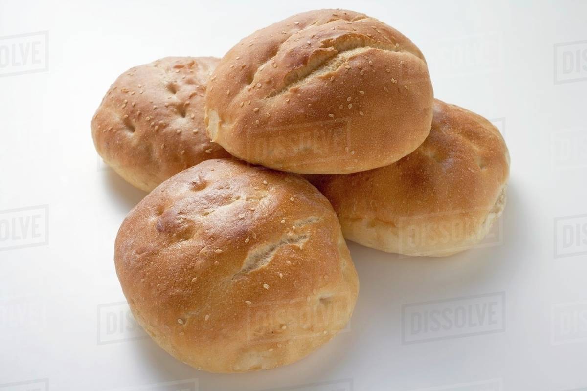 Several sesame buns Stock Photo Dissolve