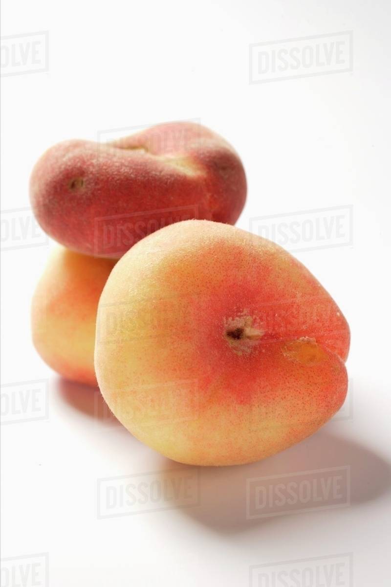 Three peaches (old variety) Stock Photo Dissolve