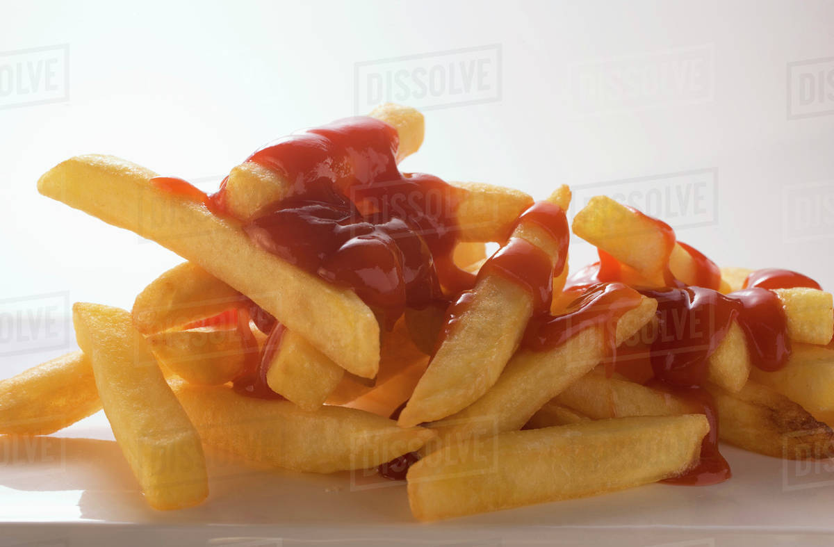 Chips with ketchup Stock Photo Dissolve