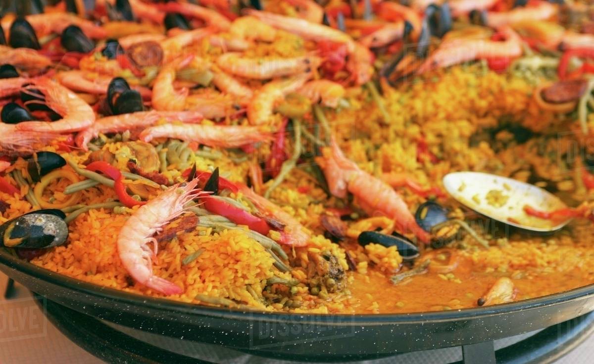Paella in frying pan (closeup) Stock Photo Dissolve