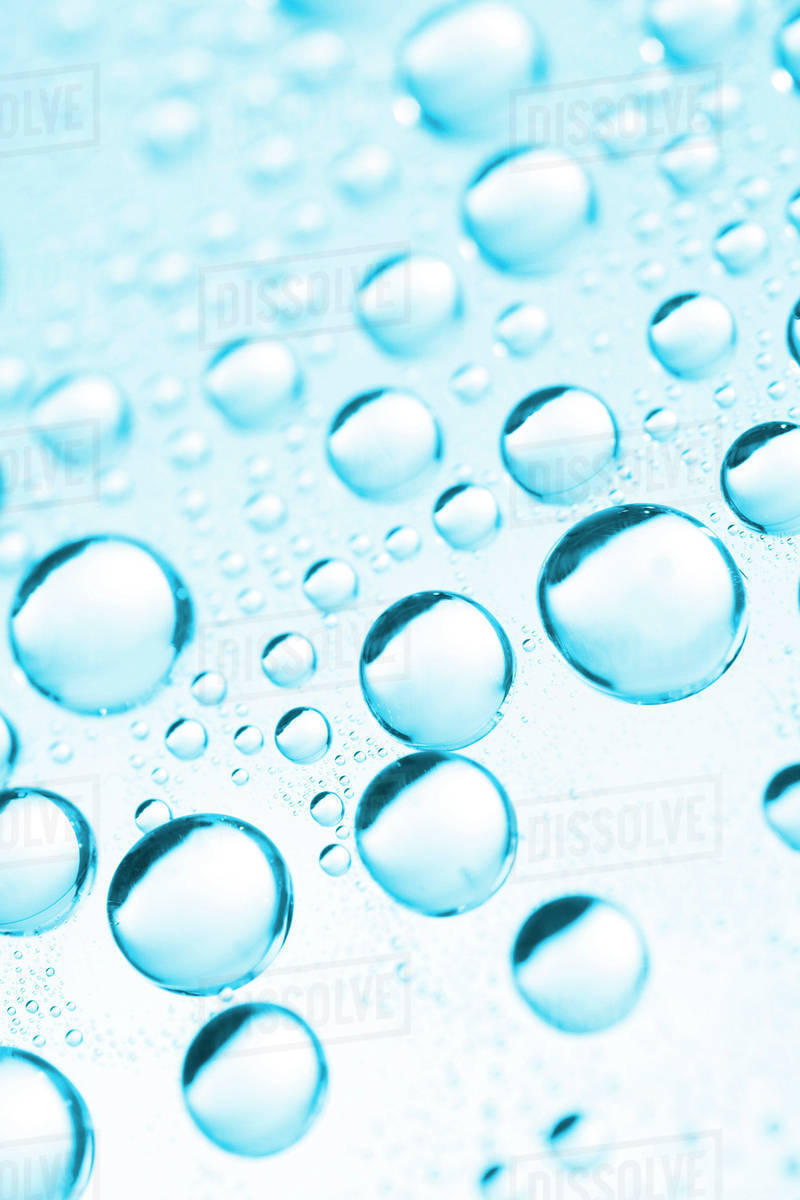 Blue bubbles, closeup Stock Photo Dissolve