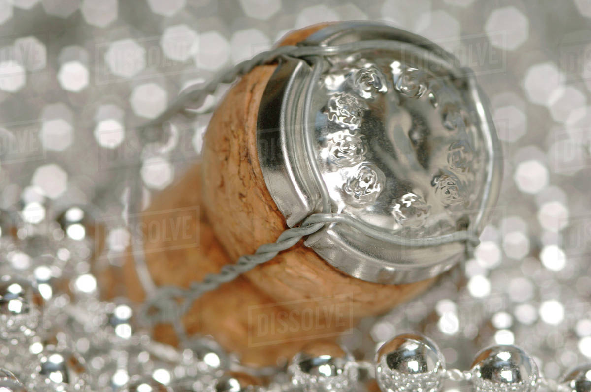 Sparkling wine cork, closeup Stock Photo Dissolve