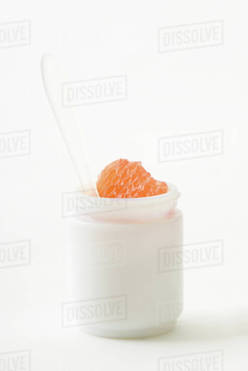 Fresh grapefruit in small container Stock Photo Dissolve