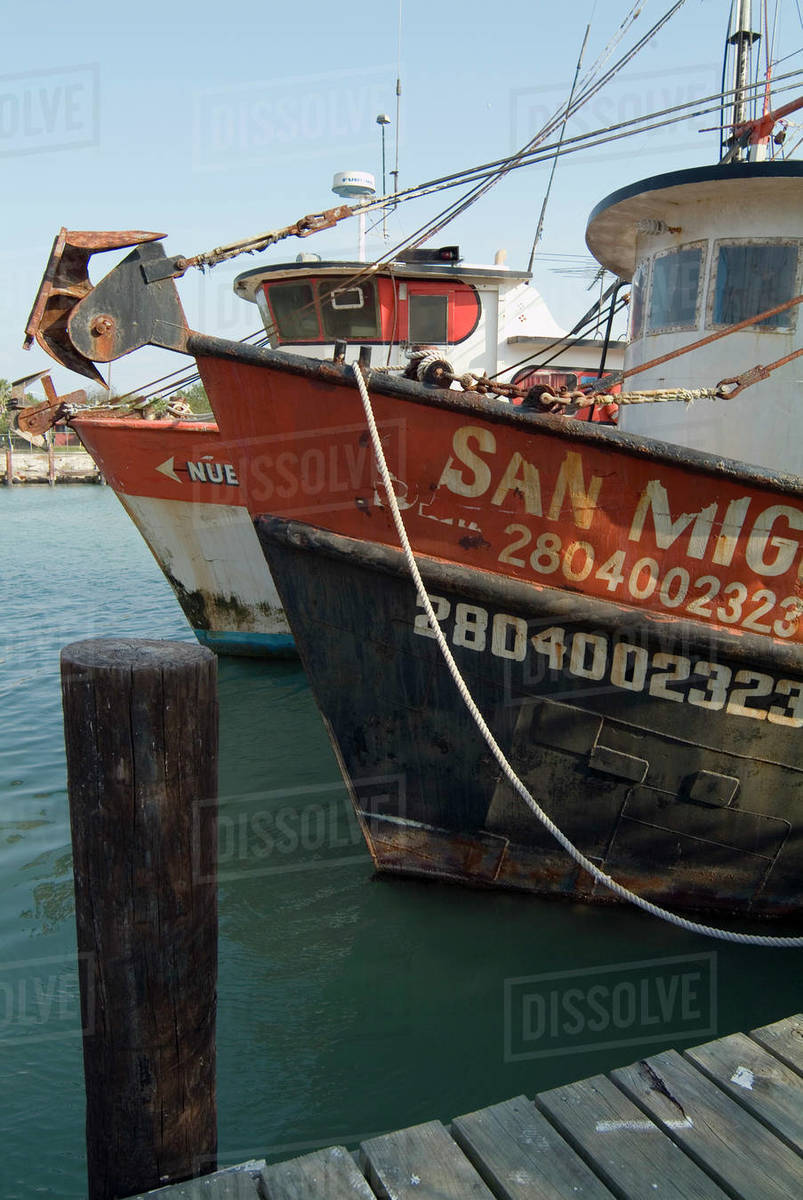 Fishing boats in harbour, Port Isabel, Texas, USA. Stock Photo Dissolve