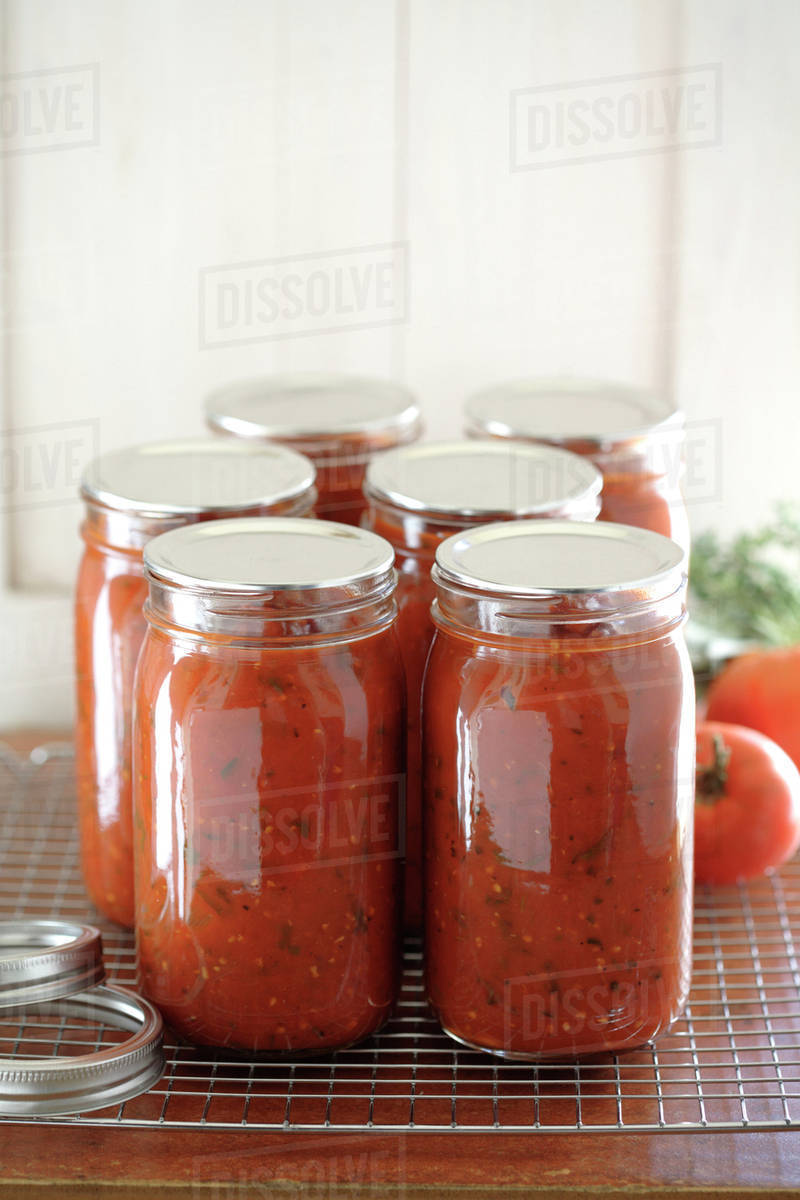 Homemade tomato sauce in jars Stock Photo Dissolve