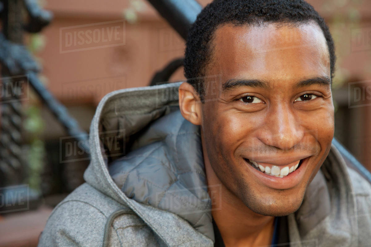 Close up of smiling Black man Stock Photo Dissolve