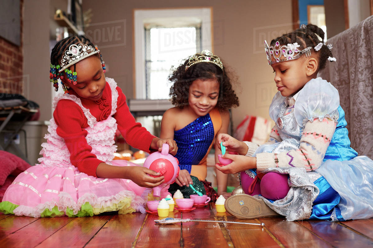 Girls playing dressup at tea party Stock Photo Dissolve
